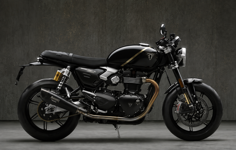 Load image into Gallery viewer, A black 2027 Triumph Speed Twin 1200 TFC motorcycle with gold accents, shown in a side profile against a dark textured studio background.