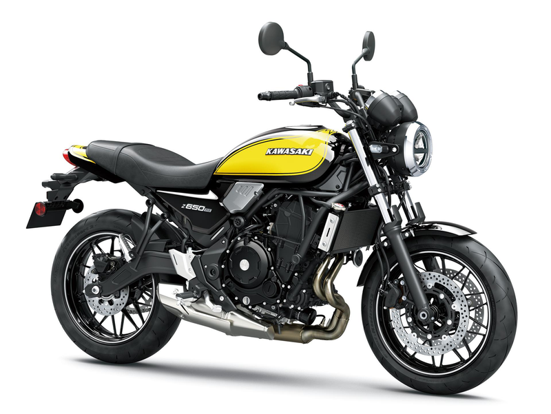 Load image into Gallery viewer, A Kawasaki Z650RS motorcycle in black and yellow, photographed from a three-quarters front angle against a clean white studio background.