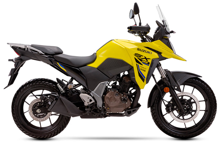 Load image into Gallery viewer, A 2025 Suzuki V-Strom 250SX motorcycle in Champion Yellow No.2 against a white background, for sale from Cyclespot Group