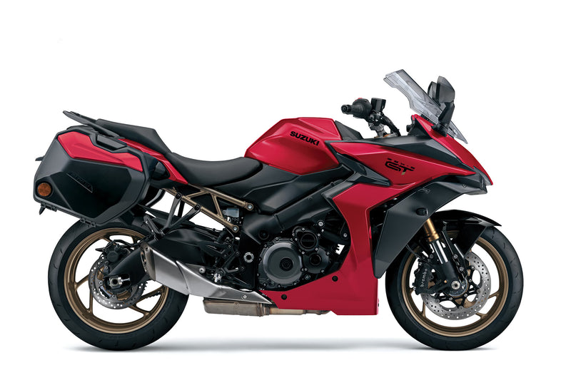 Load image into Gallery viewer, A Candy Daring Red 2025 Suzuki GSX-S 1000 TRQ motorcycle with side panniers and a windscreen, photographed from a side profile against a plain white background.
