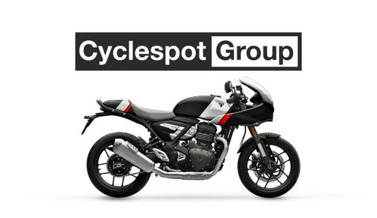 2026 Triumph Thruxton 400 in Phantom Black/Aluminium Silver with Cyclespot Group logo above it on a white background