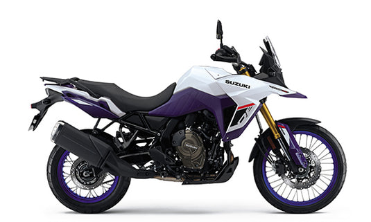 2026 Suzuki V-Strom 800 DE Adventure motorcycle in a white and purple color scheme, shown from a side profile on a clean white background.